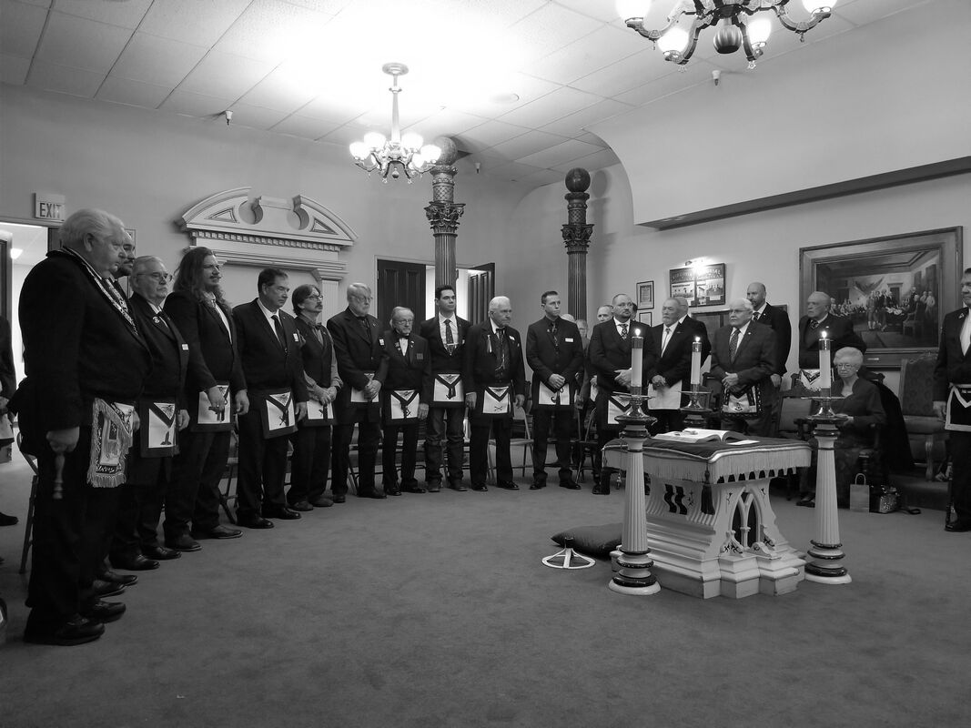 Officers of Escurial Lodge No. 7 assembled in the lodge room
